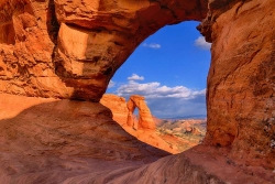 Delicate Arch Through A Window